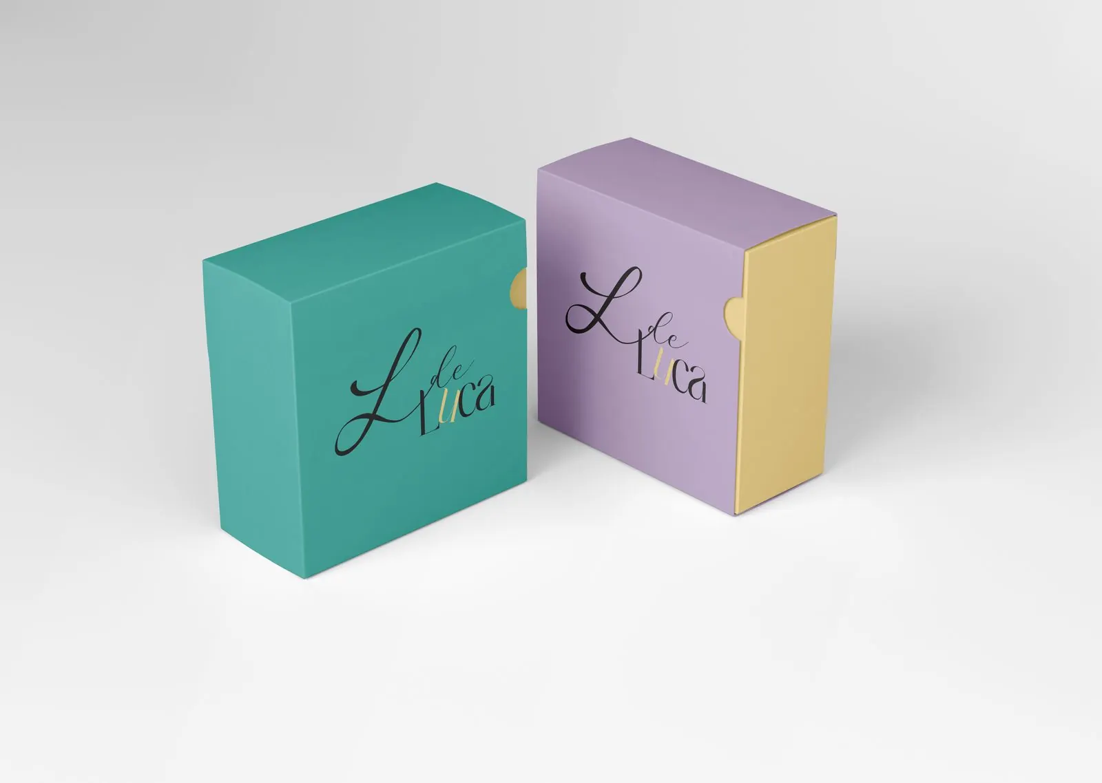Cajas de regalo de L de Luca en verde y lila